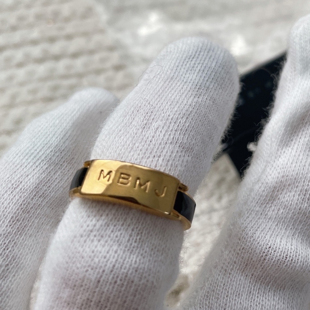 Marc By Marc Jacobs logo gold and back ring (Size 7)
